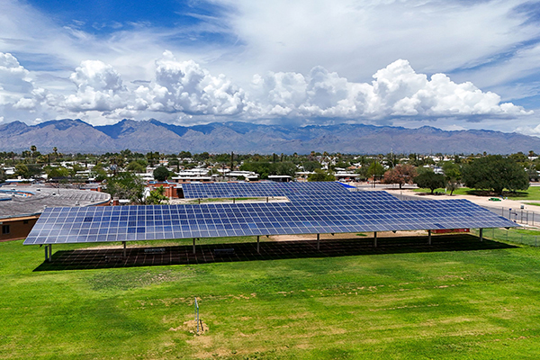 Solar panels in front of mountains