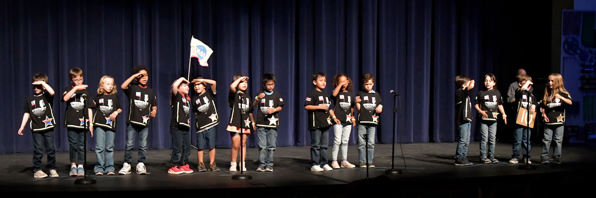 Student perform on stage at the OMA Showcase.