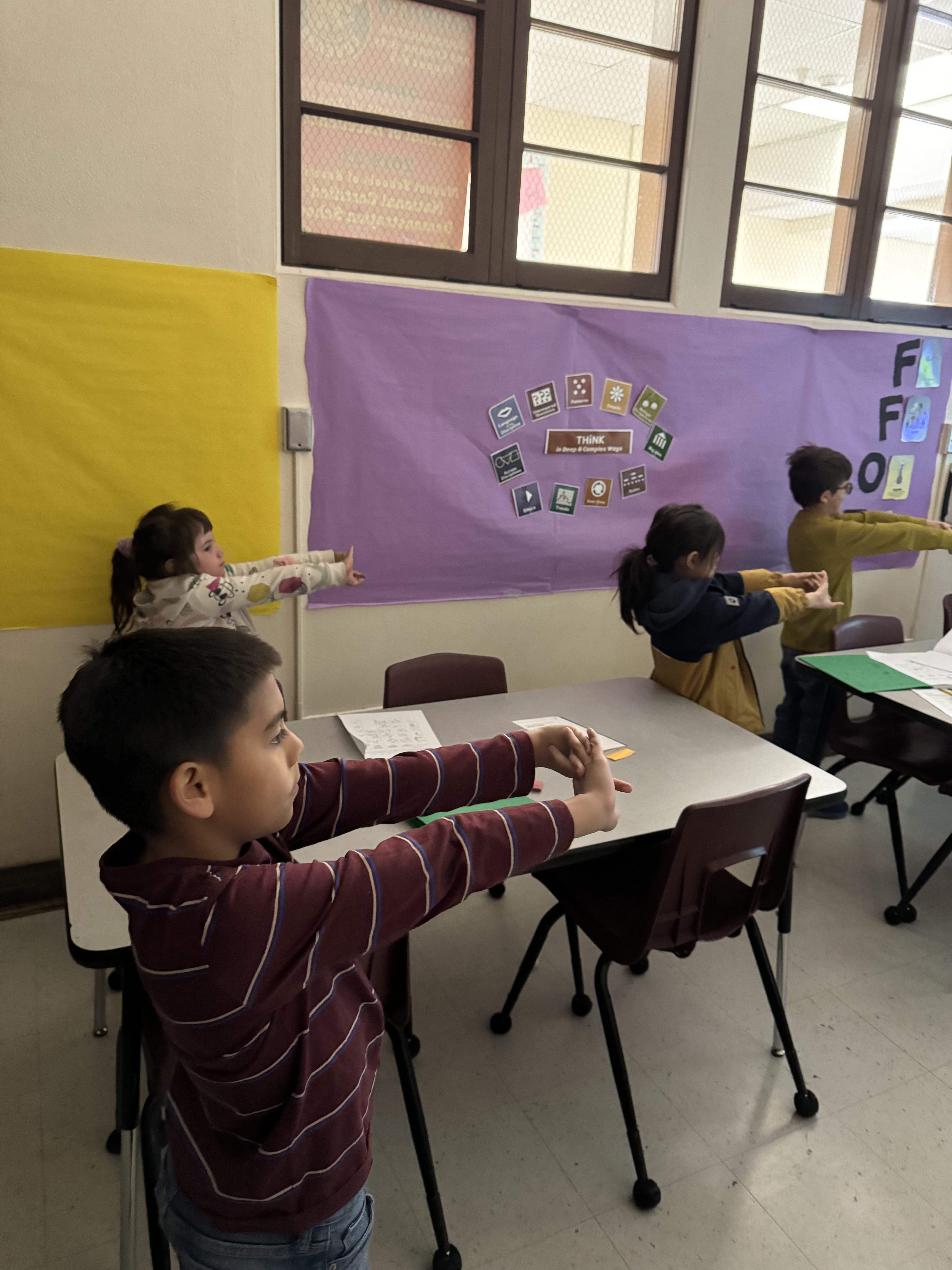 Students participating in astronaut physical fitness challenge.