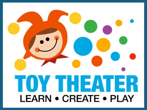 Image of a child's head dressed in a joker costume with colorful dots all around of various sizes along with the words TOY THEATER LEARN CREATE and PLAY