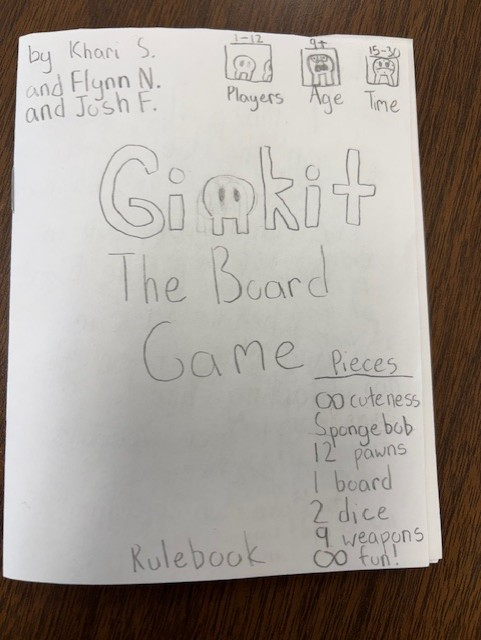 This is an image from a series of pages in a students rule book for the board game they created.