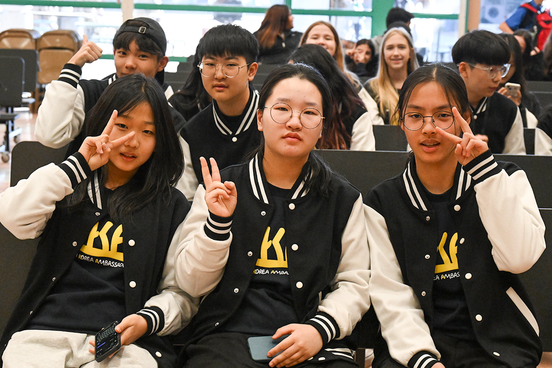 Korean students give peace signs