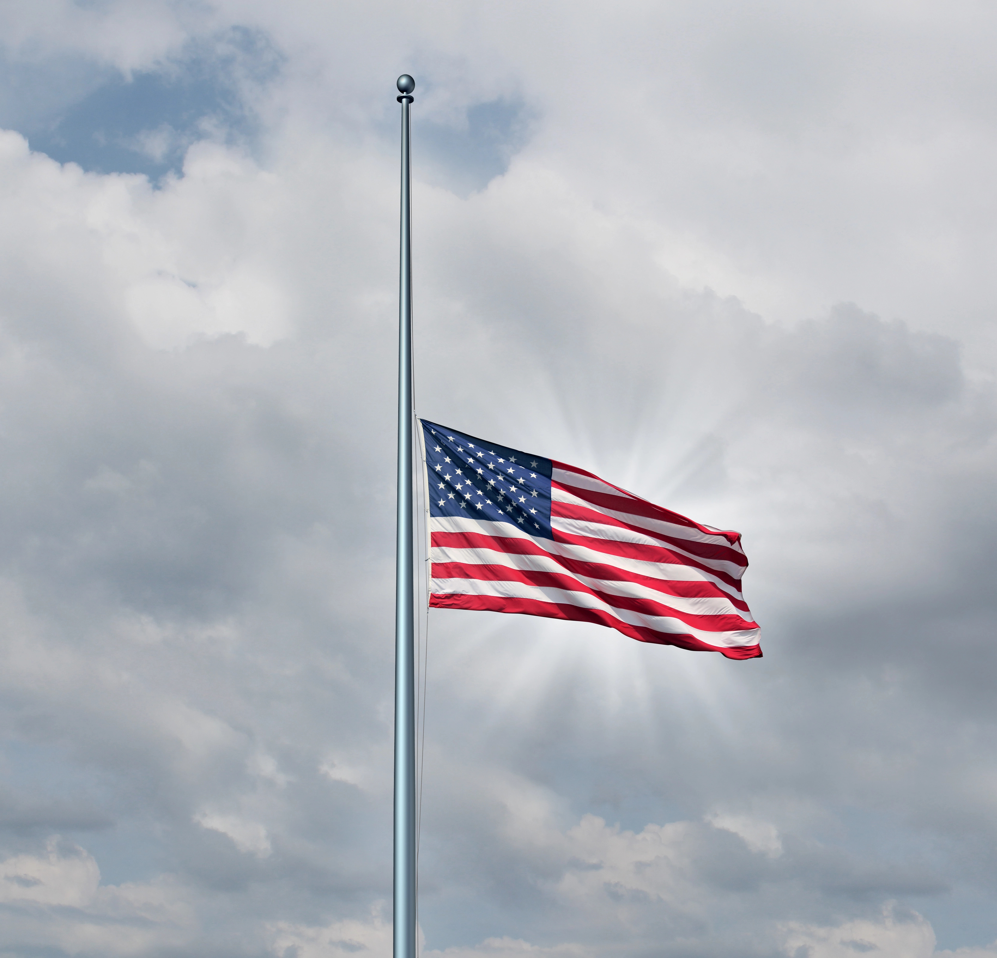 American flag flying at half-staff