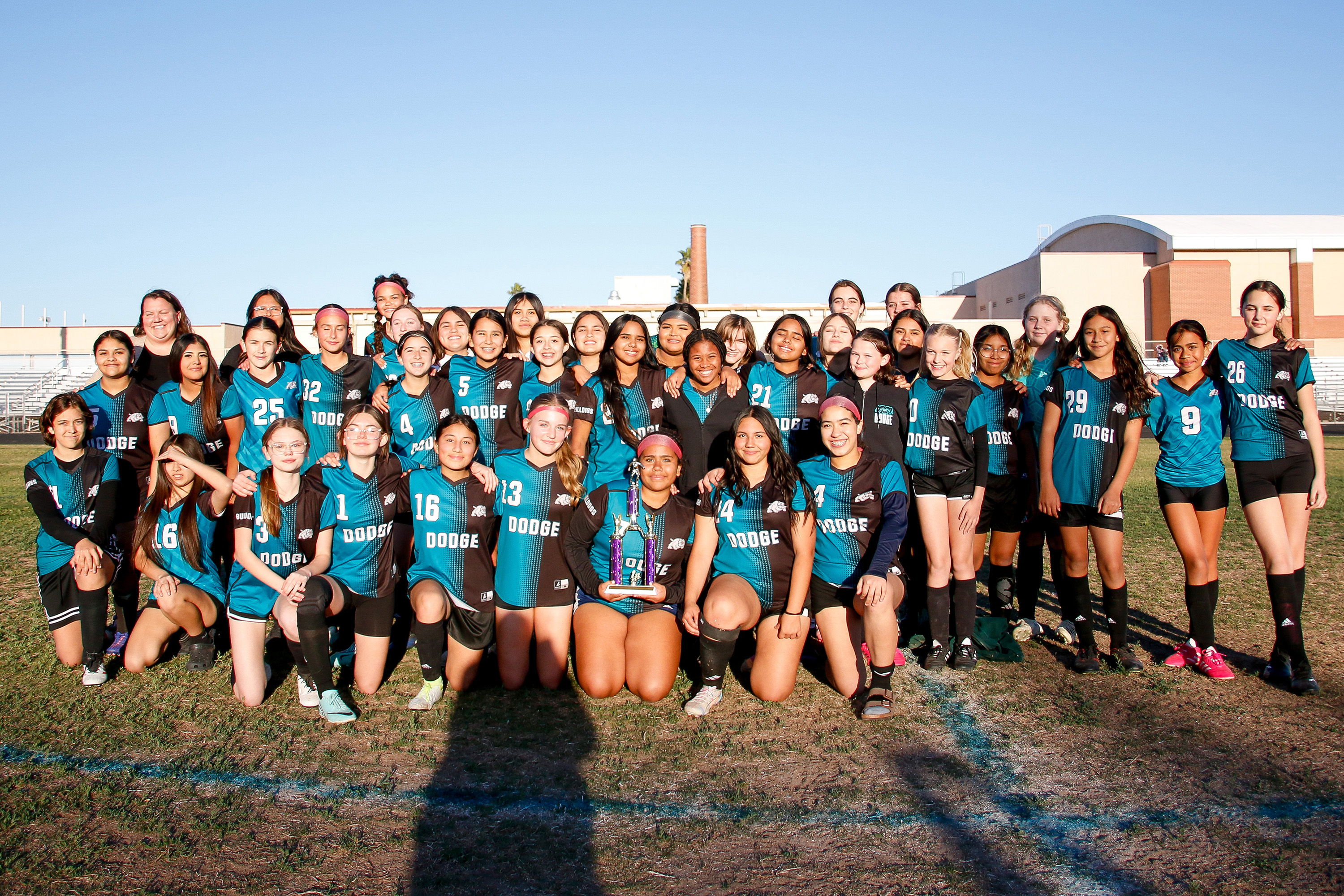 Dodge girls soccer team with their trophy