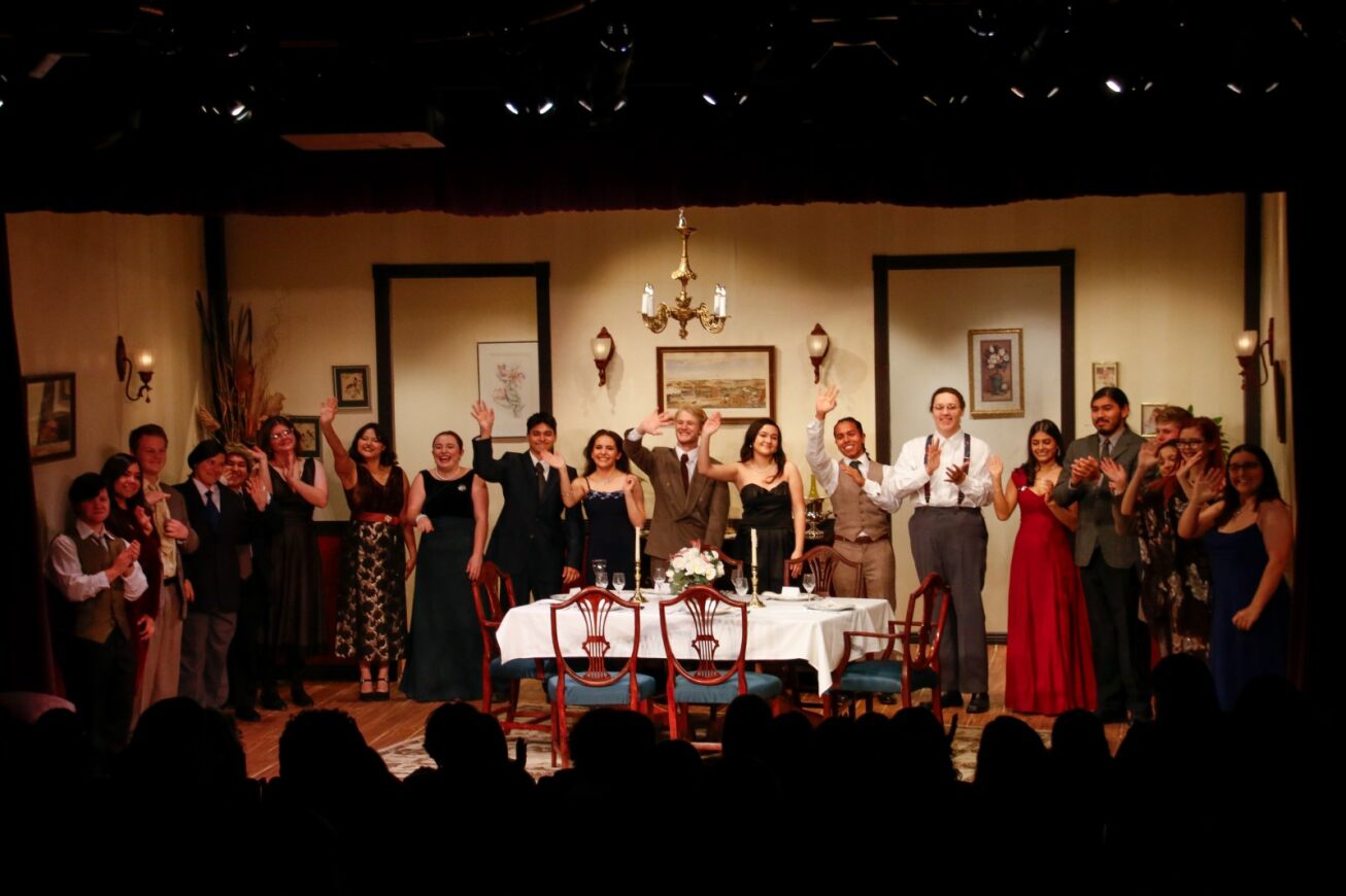 Performers in The Dining Room stand on stage at the end of the play